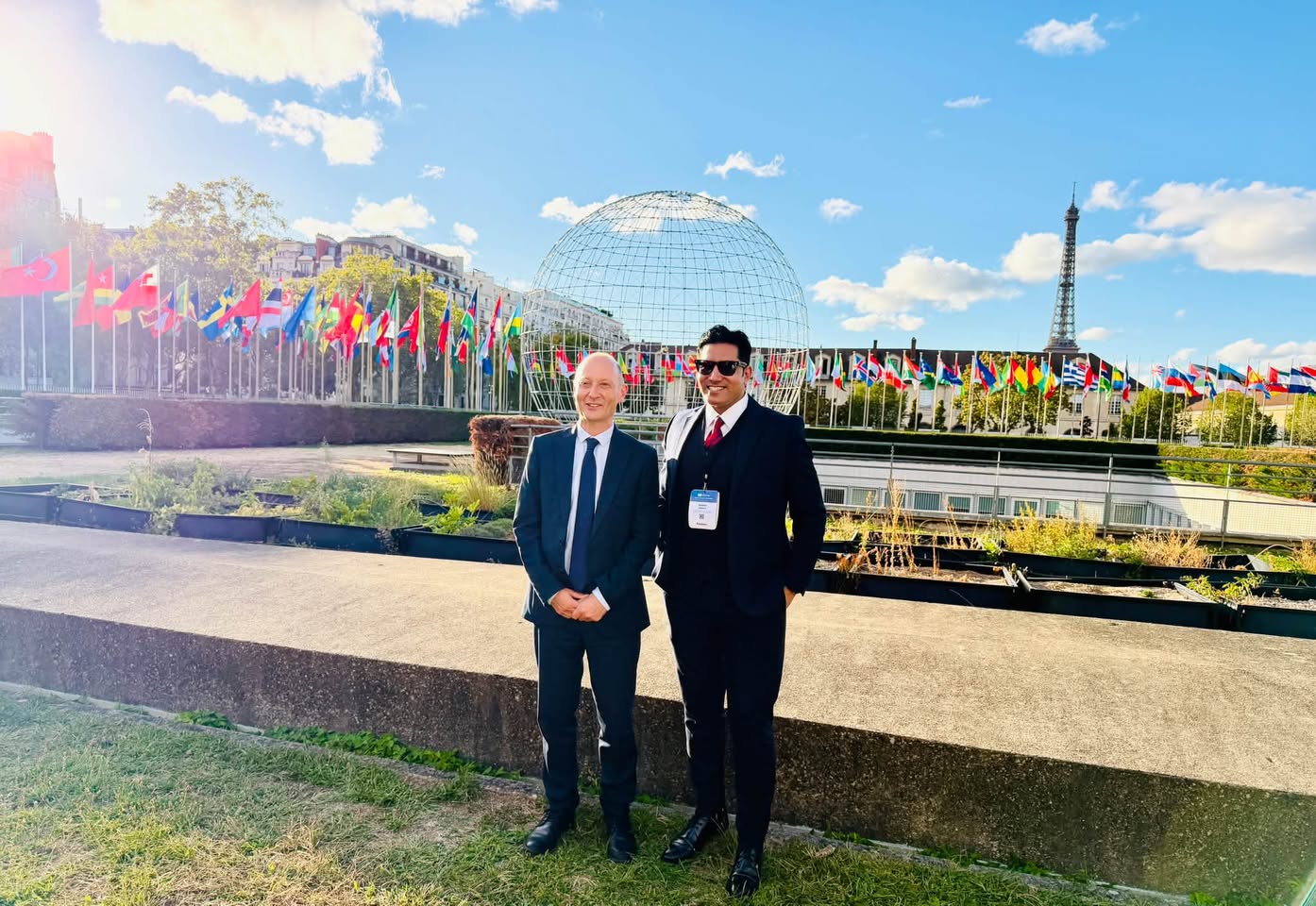 Rizwan Anwar with UK Minister for Early Education Paul Waugh MP at UNESCO Headquarters in Paris