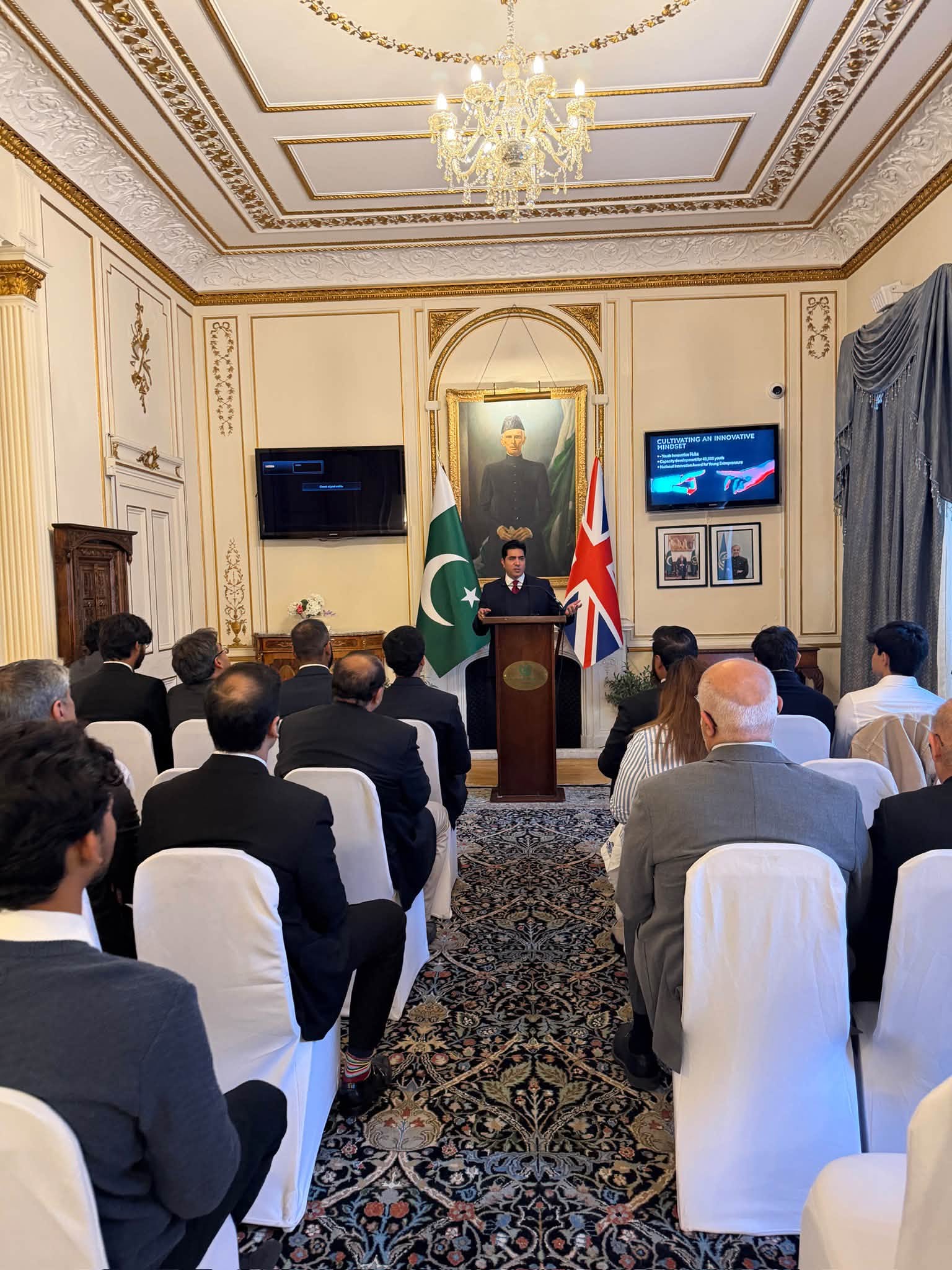 Audience seated facing a speaker at the Prime Minister's Youth Programme engagement session at the Pakistan High Commission in London